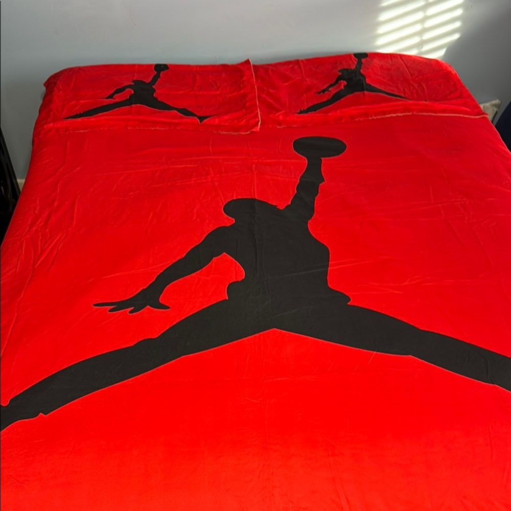 Air Jordan Red/Black Bedding Set.  Comes with two pillows covers and a duvet.